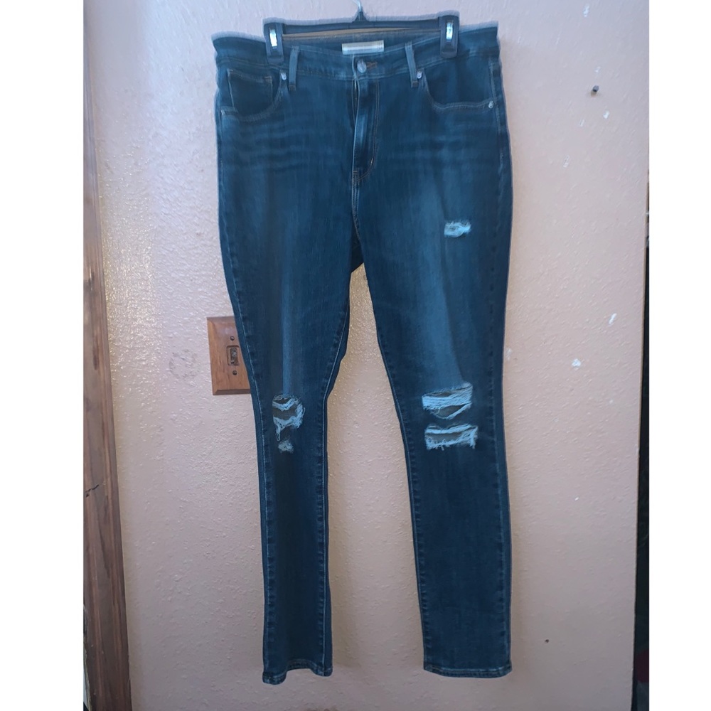 Dark washed blue jeans
